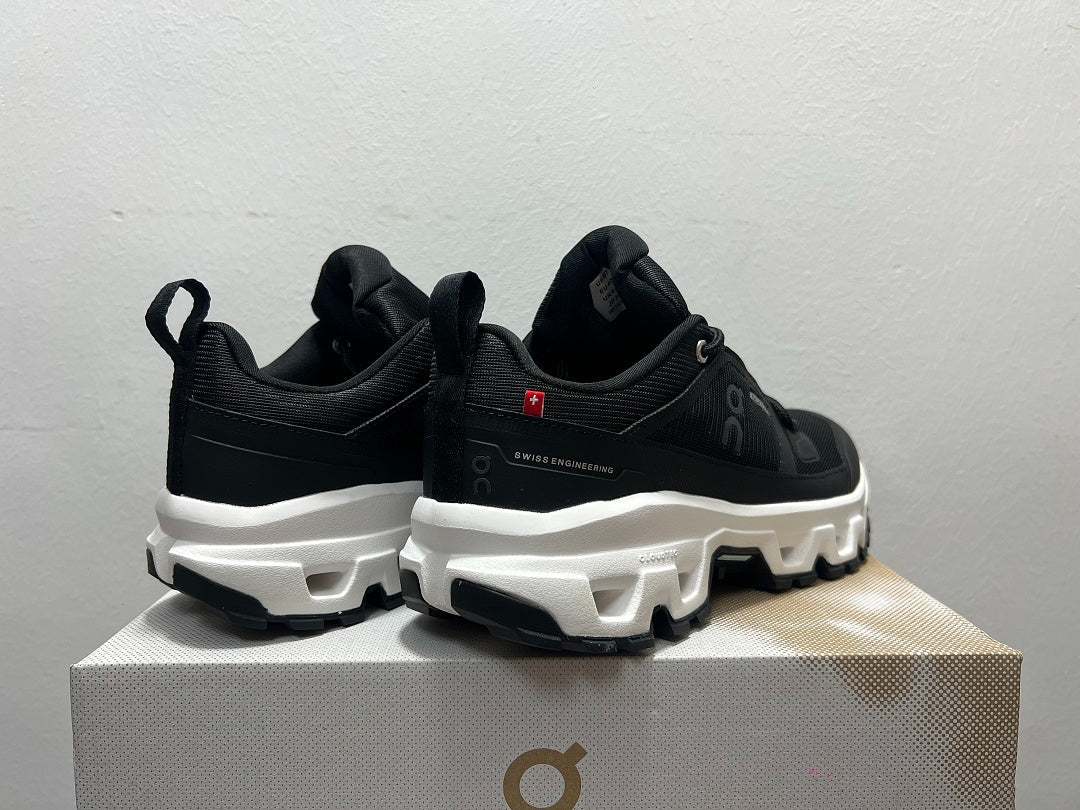 On Cloudrock Low Waterproof Hiking Shoes in Black / White