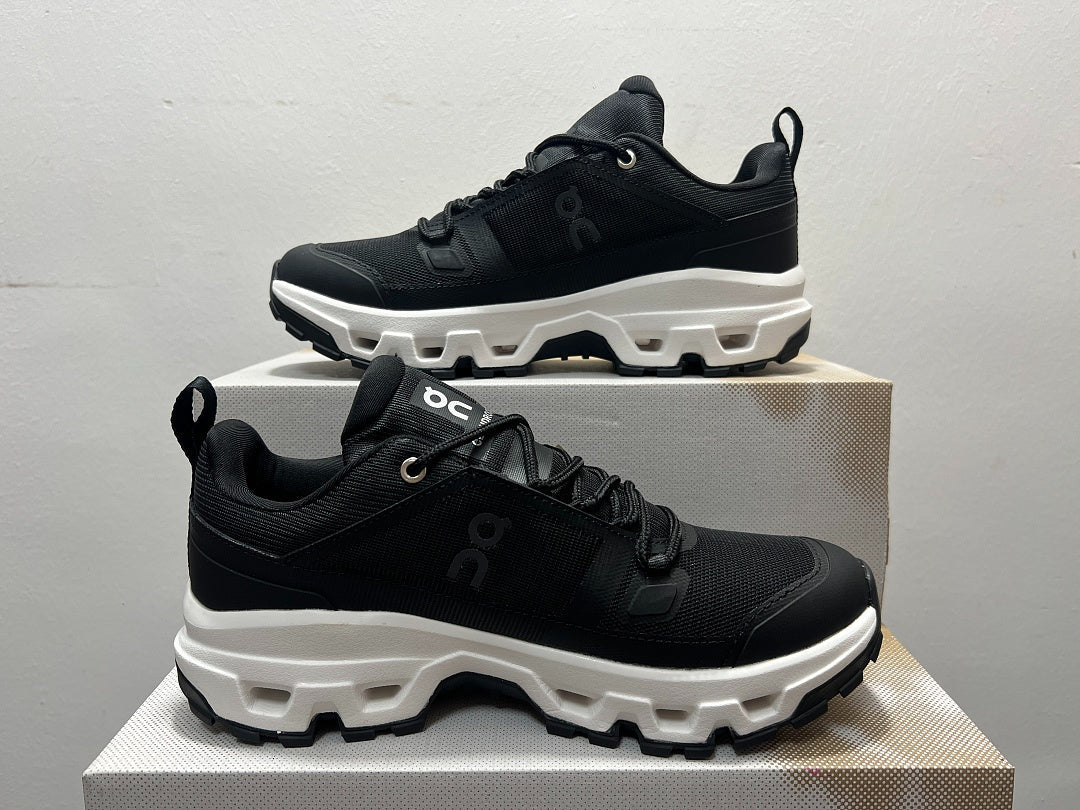 On Cloudrock Low Waterproof Hiking Shoes in Black / White